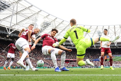 Konstantinos Mavropanos, Thomas Soucek and Mads Hermansen of West Ham United defend their goal.