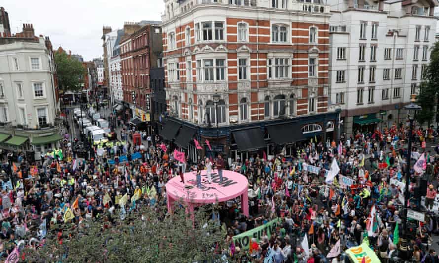 The pink table structure set up by Extinction Rebellion climate activists in Covent Garden, London.