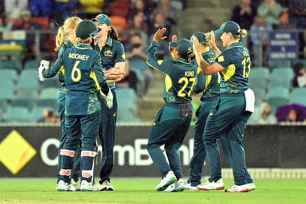 Australia’s players celebrate after dismissing Nat Sciver-Brunt