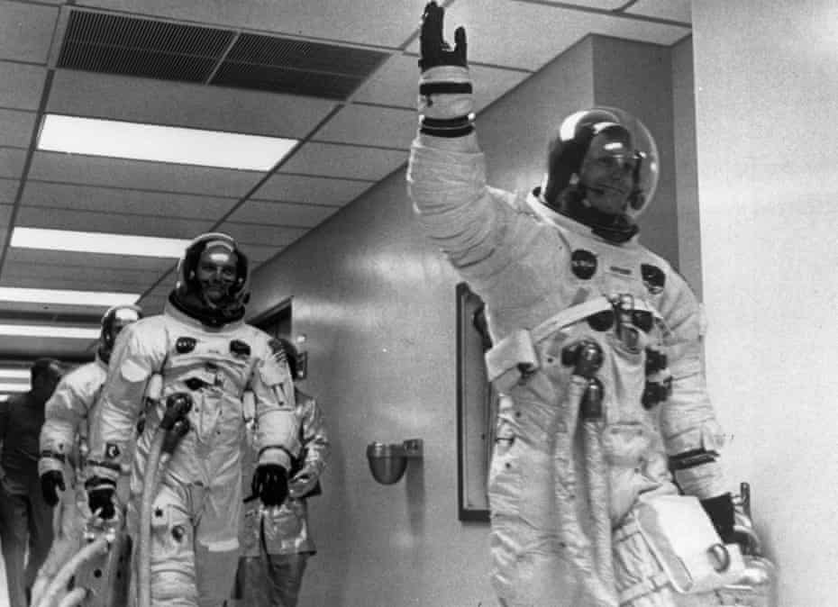 neil armstrong leads buzz aldrin and michael collins out to apollo 11
