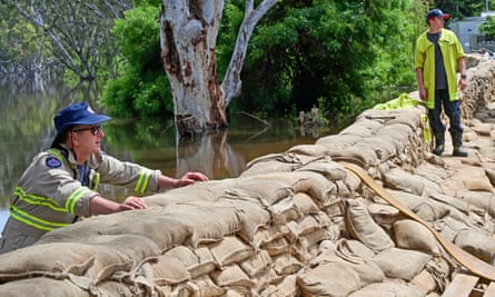 Country Fire Authority crew keep watch at Campaspe River in Echuca, Victoria on Sunday.
