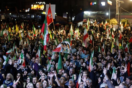 Thousands of people carrying Iranian flags, gathered in Revolution Square to protest against the US and Israel, in Tehran, Iran on April 25, 2026.