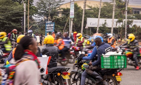 A street in Kenya crowded with motorbikes