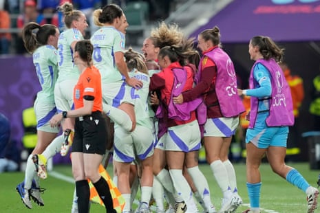 Wales’ Jess Fishlock celebrates with teammates after scoring her sides equaliser against France.