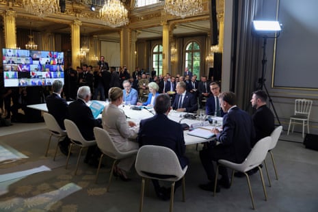 Ukraine’s president Volodymyr Zelenskyy, right, and French president Emmanuel Macron, second from right, attend with others international leaders a summit on Ukraine at the Élysée Palace, in Paris, France.