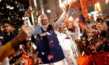 The Indian prime minister, Narendra Modi, arrives at the party headquarters to deliver a victory speech, in New Delhi