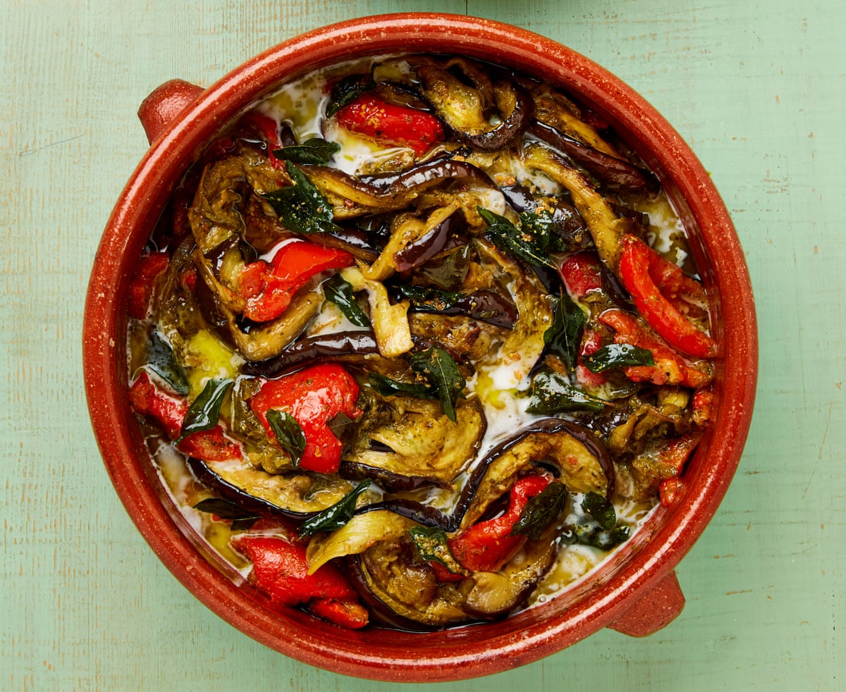 Yotam Ottolenghi’s aubergine and red pepper pahi with fenugreek and curry leaf oil.