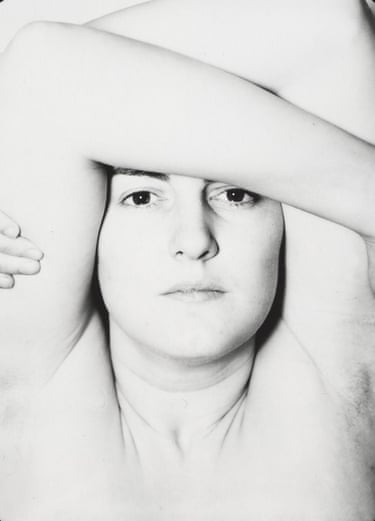 A person with their hands above their face