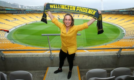 Annalie Longo poses with a Wellington Phoenix scarf