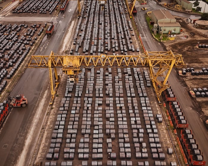Trump escalates trade war with Canada with threat to raise tariffs on vehicles and steel – live