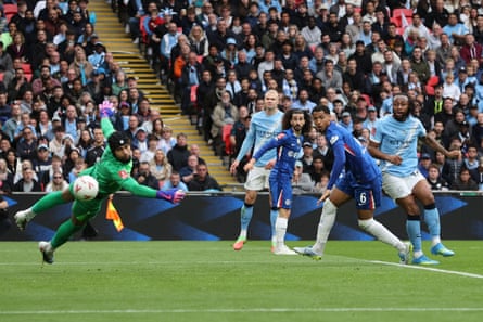 Antoine Semenyo (right) flicks in the winning goal for Manchester City