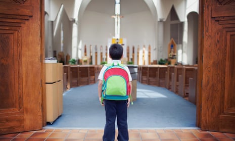 School boy at door of church