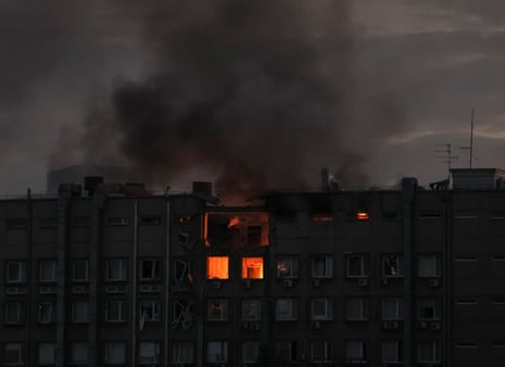 Smoke rises after a Russian drone strike in Kyiv.