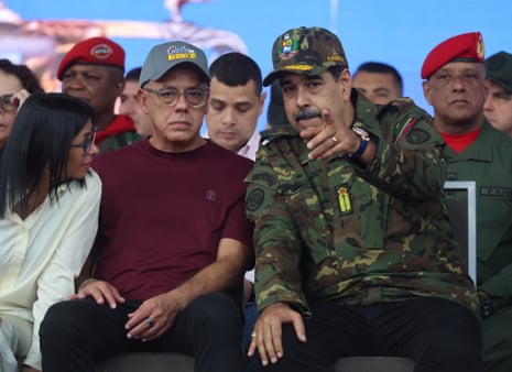 Venezuelan President Nicolas Maduro (R) speaks with President of Venezuelan Assembly (AN) Jorge Rodriguez (C) and Venezuelan Vice president Delcy Rodriguez during an event in Caracas on 25 November 2025. EPA/MIGUEL GUTIERREZ
