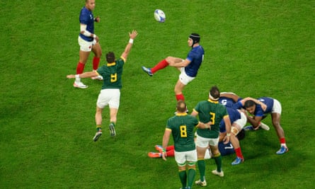 France’s scrum-half Antoine Dupont (right) kicks the ball against South Africa