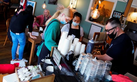 Cafe staff prepare coffees in Melbourne, Australia