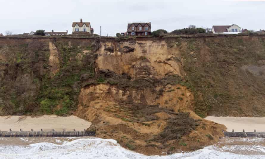 Houses left perilously close to the cliff collapse in Mundesley