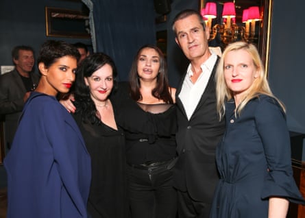 Group of glamorous people at a restaurant