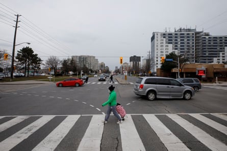 Shoppers cross Steeles Avenue on 3 December.