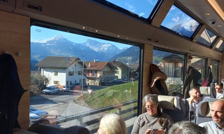 Passengers get great views of the mountain slopes.