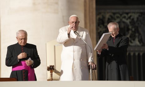 Pope Francis blesses the audience at the end of his weekly general audience in St. Peter's Square at The Vatican, Wednesday, Nov. 23, 2022.