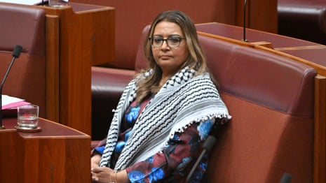 Mehreen Faruqi sanctioned for Gaza sign protest as Greens senator accused of 'street theatre' | Australian politics | The Guardian
