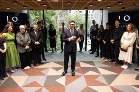 Andy Burnham speaking to ministers and staff at foyer of No 10 North.