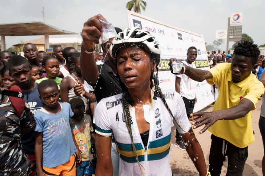 Elizabeth Mansaray cools down after more than three hours cycling in the heat