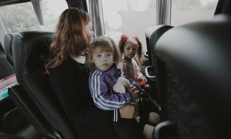 Children in Ukraine with whom the group Kidsave has worked ride a bus in 2022.