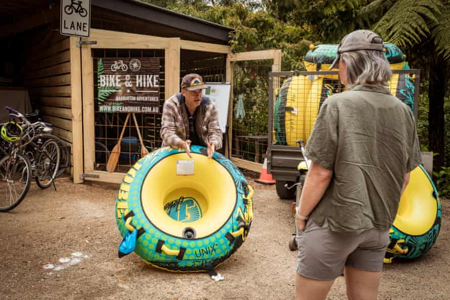 Guardian Australia journalist Stephanie Convery goes through a safety drill with Richard, the owner of Bike and Hike, before tubing down the Yarra River near Warburton.