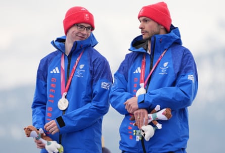Neil Simpson and Robert Poth celebrate with their silver medal.