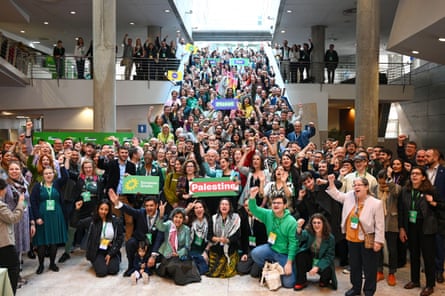 People from Green parties across Europe pose for a group photo at the European Green party congress in Lisbon