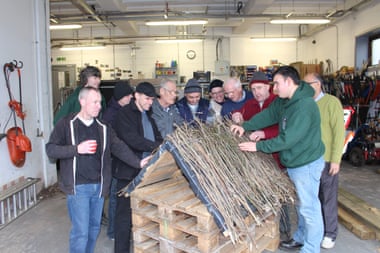 At the Men in Sheds project in Bolton, volunteers make bird tables and bug hotels