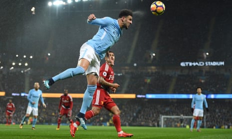 Manchester City defender Kyle Walker heads the ball away during their win over Watford.