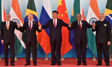 (L-R) Brazil’s President Michel Temer, Russian President Vladimir Putin, Chinese President Xi Jinping, South Africa’s President Jacob Zuma and Indian Prime Minister Narendra Modi pose for a group photo during the Brics summit in China.