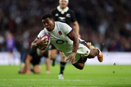 Immanuel Feyi-Waboso dives over to scores a try during the Autumn Nations Series match against the All Blacks at Twickenham last year.