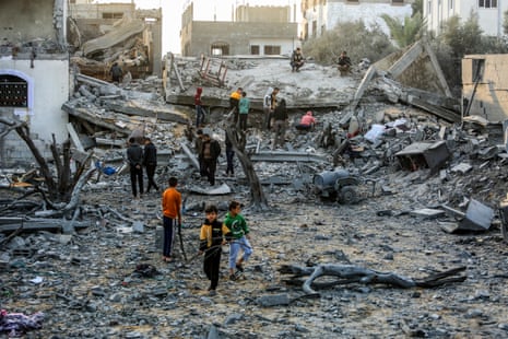 A view of the heavily damaged, collapsed buildings after Israeli attacks hit a building in Rafah, Gaza.