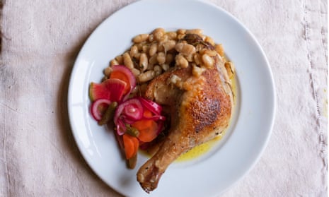 In for a duck: roast duck legs with cannellini beans and pickles.