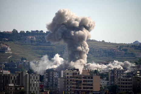 Smoke billows from a city in southern Lebanon.