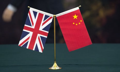 The union flag and the flag of the People's Republic of China. 