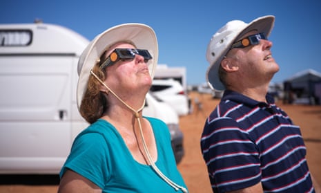 People preparing and watching the total solar eclipse at a viewing site 35km from Exmouth, Western Australia, Thursday, April 20, 2023.