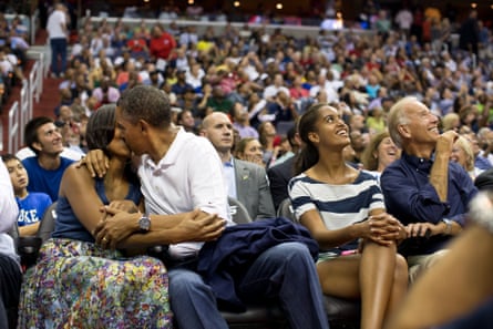 From left: Michelle Obama, Barack Obama, Malia Obama and Joe Biden at a basketball game in Washington DC in 2012.