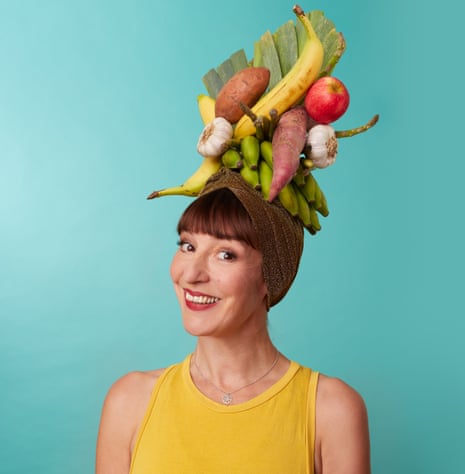 Zoe Williams with fruit and veg on her head