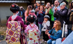 Tourists taking photos in the Gion district last year.