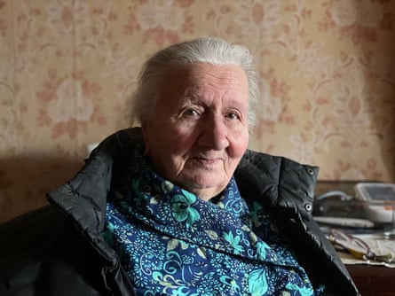 A portrait of Halyna Vasylivna sitting in her flat