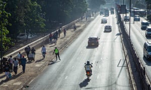 A lone skater makes the most of some relatively light afternoon traffic.