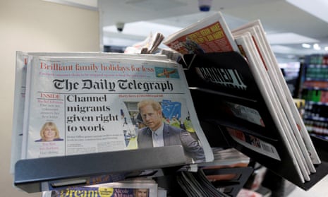 Daily Telegraph newspapers on a shelf