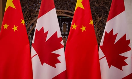 chinese and canadian flags