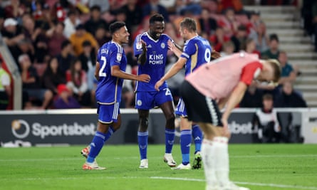 Wilfred Ndidi (centre) is congratulated by his teammates after making it 3-1 to Leicester