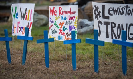 Crosses and signs with the names of victims at a memorial after a mass shooting, which killed 18 people and injured 13 in Lewiston, Maine, on 25 October 2023.